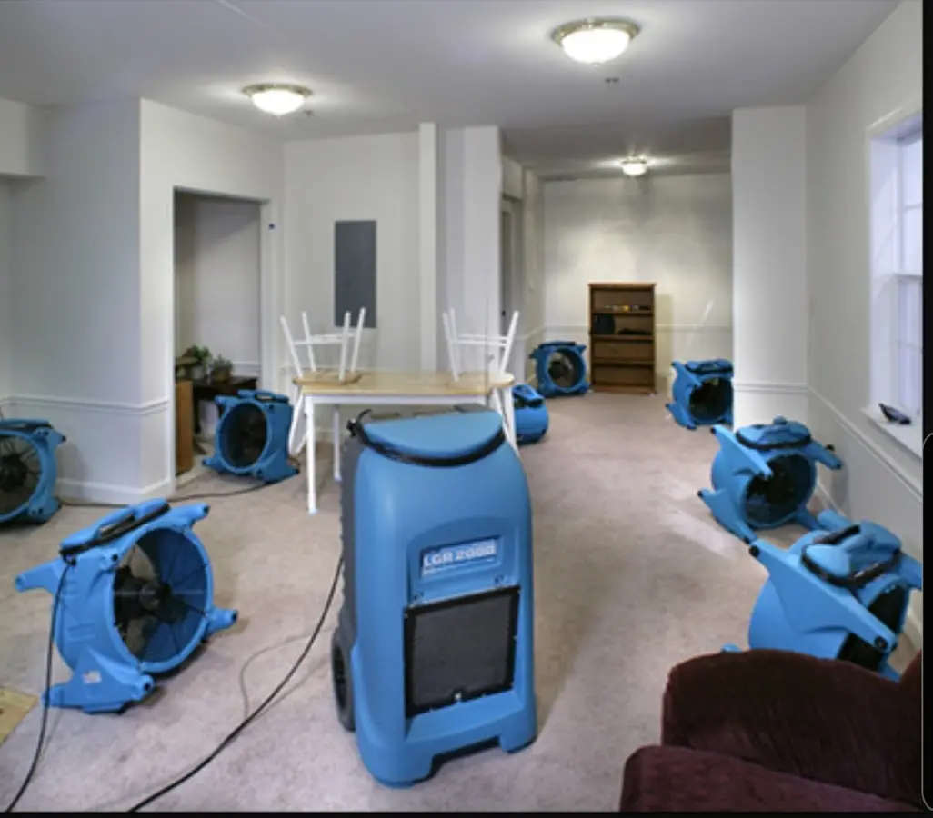 Air movers and dehumidifier setup for Water Extraction & Removal in Sumpter